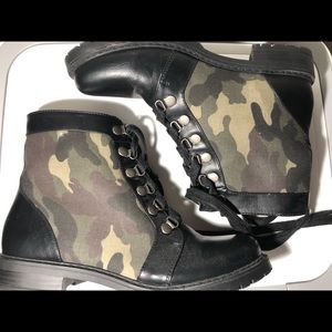Black and camouflage combat boots